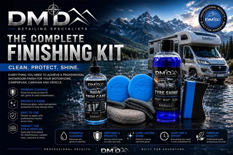 The Complete Finishing Kit from DMD: Trim Care, Tyre Shine, applicator pads, microfibre cloths and a tyre applicator in front of a motorhome